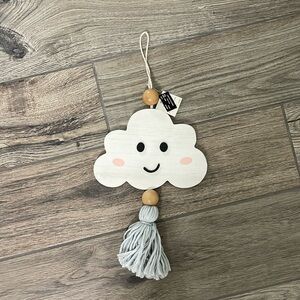 Reversible, hanging wooden cloud with eyes